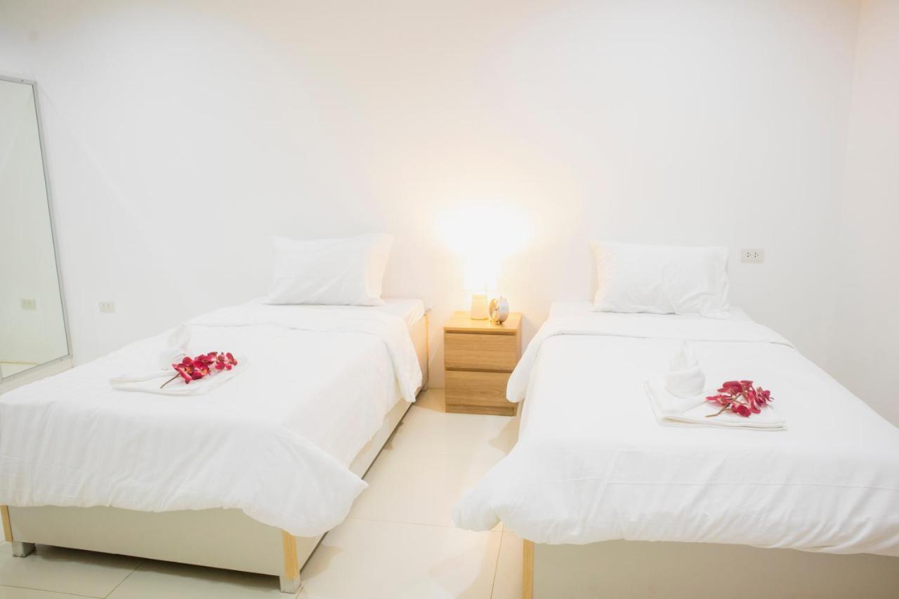 ตะวันแมนชั่น Apartman Ban Na Khua Kültér fotó
